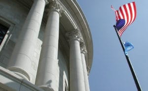 state of ok capitol dome exterior with flags okc ok